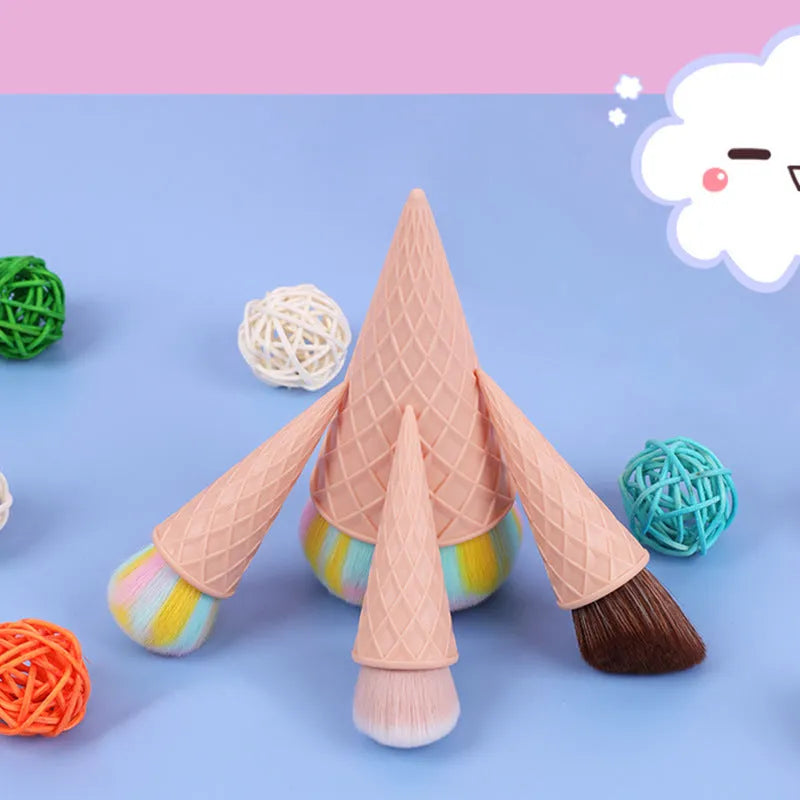 Set of 4 ice cream themed makeup brushes with artificial fibre bristles and plastic handles in paper box
