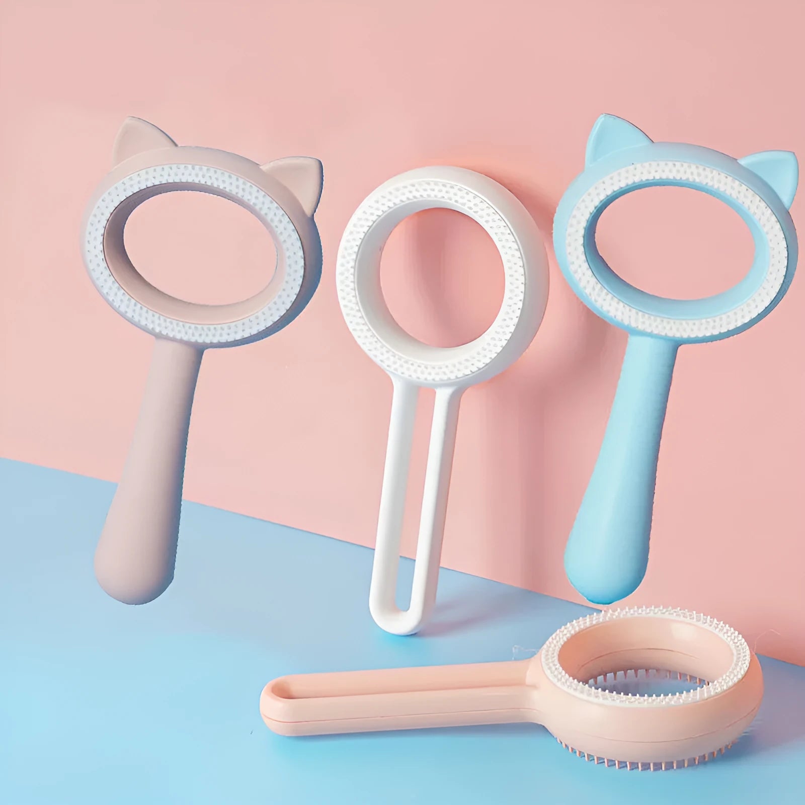 Double-sided pet hair removal brush in blue with ABS and TPR material, round shape on white background.