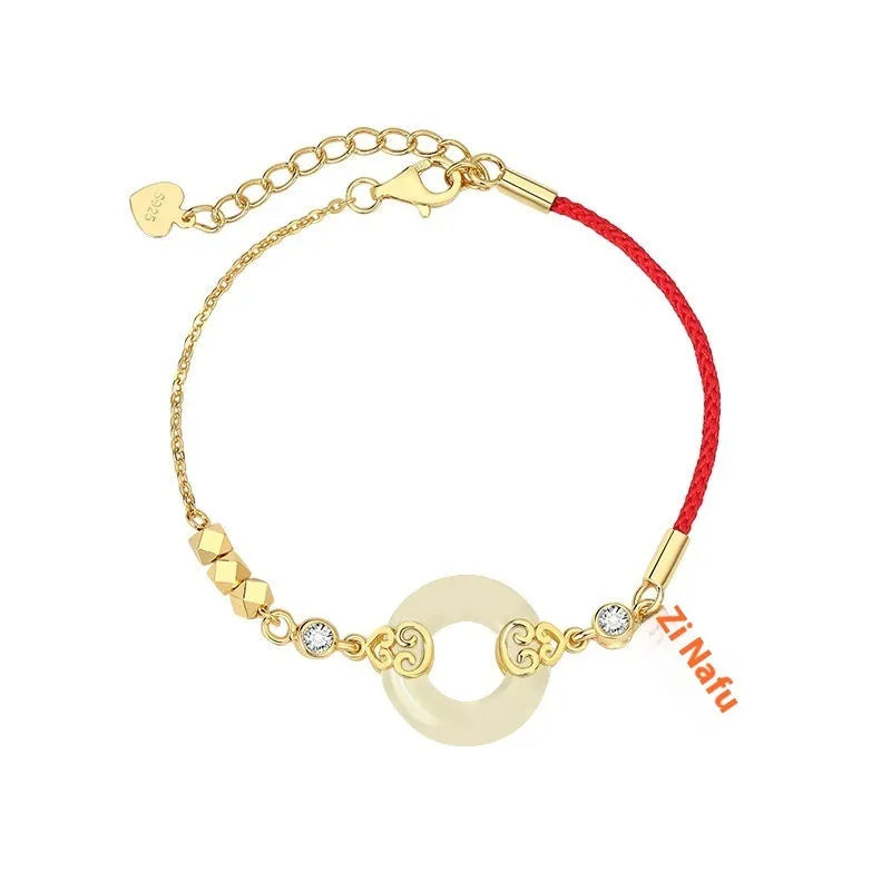 Women's Chinese style Hetian jade and sterling silver jewellery set showing bracelet, necklace, and earrings.