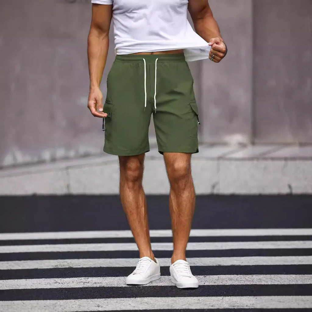 Men's loose-fitting straight-leg work shorts in fluorescent green cool silk cotton fabric.