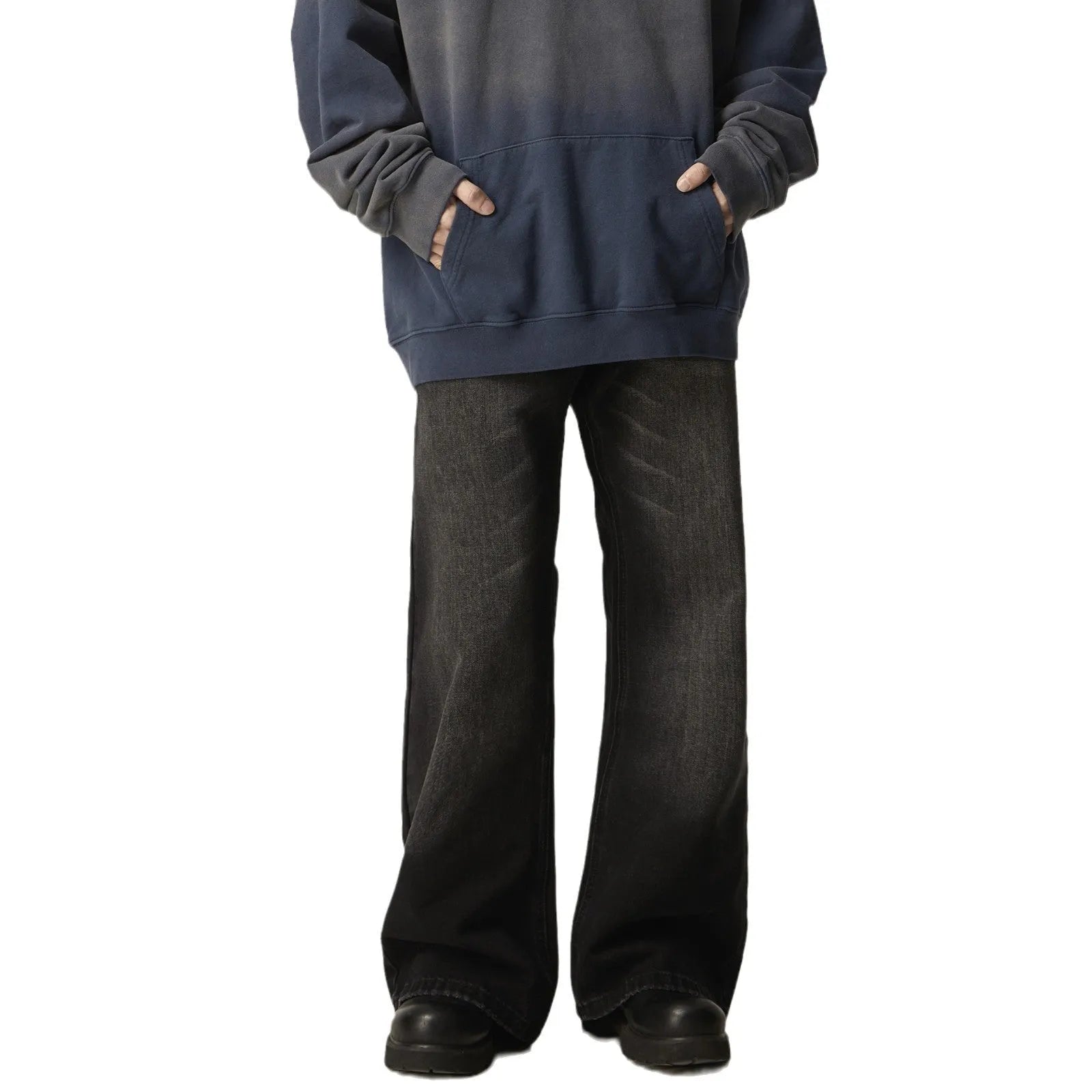 Black straight-leg jeans with retro styling and loose fit on man
