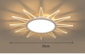 Modern circular aluminium LED ceiling lamp with remote control for dimmable lighting.