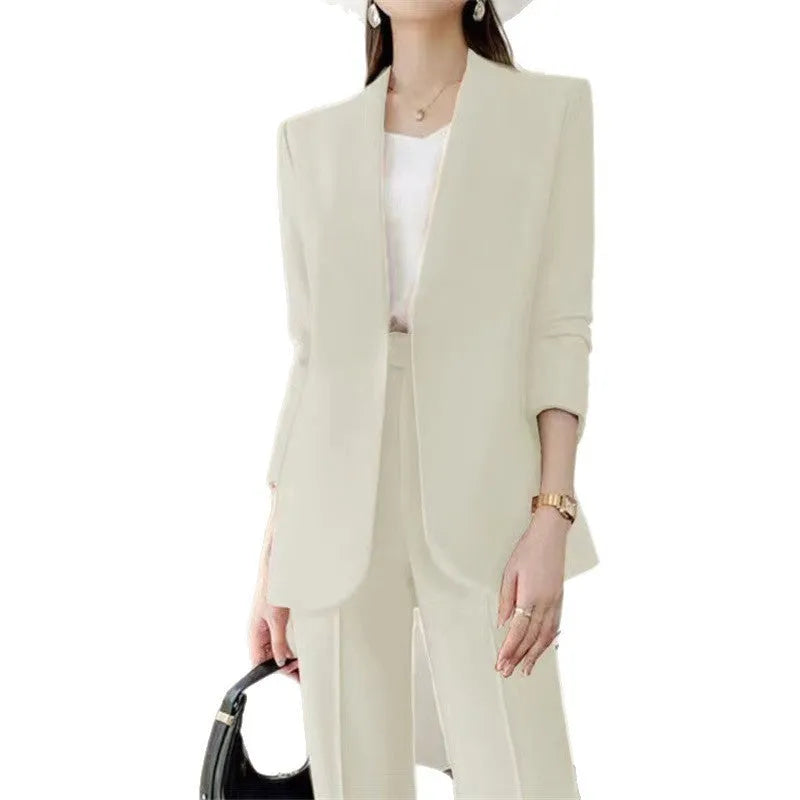 Korean-style women's business suit set in beige, polyester blazer and trousers, on a model in a studio setting