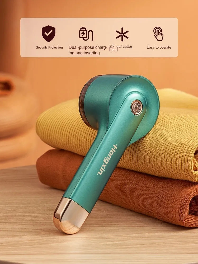 USB rechargeable hair ball trimmer for removing fabric pills from clothing and sofas.