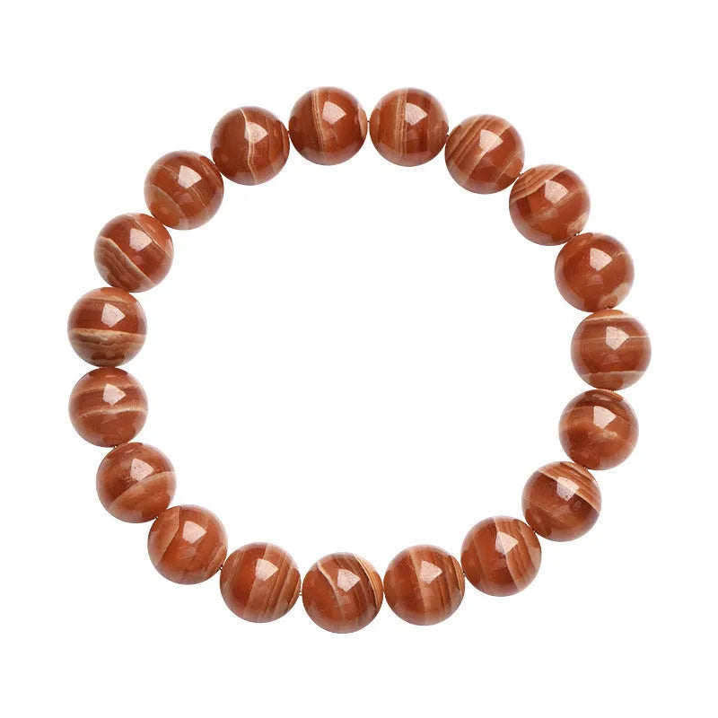 Natural Peruvian rhodochrosite bead bracelet in old mine colour, showing round 8mm beads.