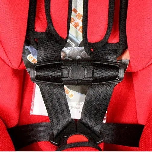 Black nylon seat belt clip for child car seat harness management.