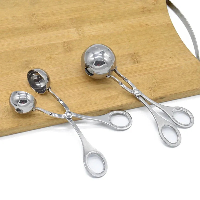 Stainless steel meatball maker tool clip with water-polished finish forming a uniform ball