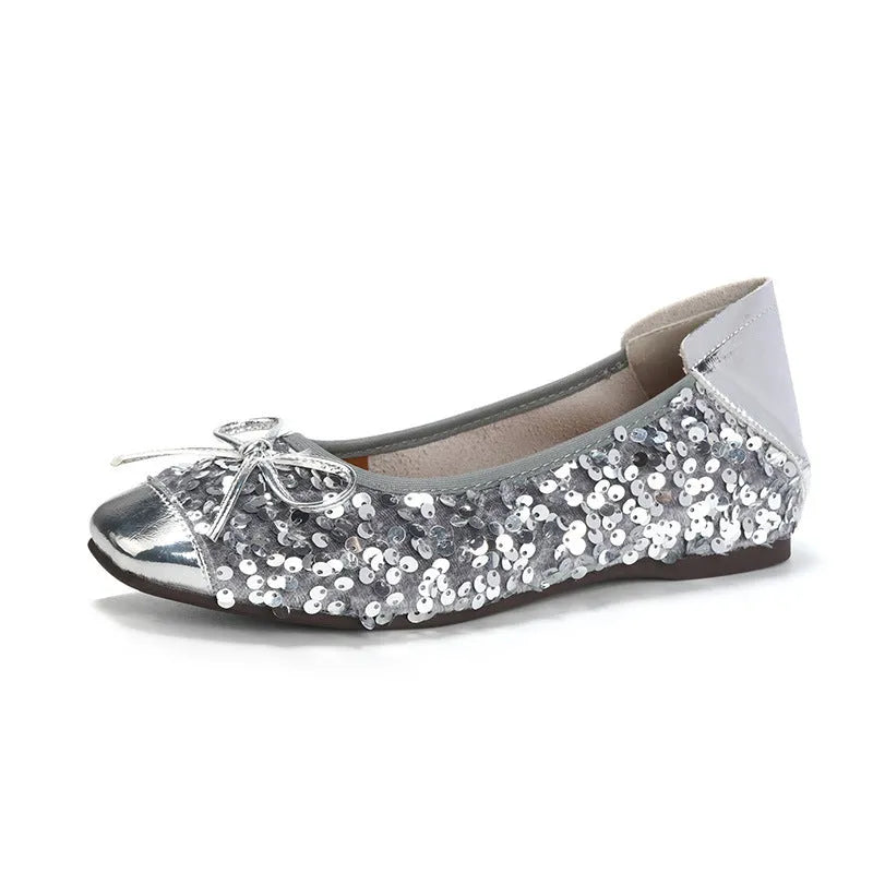 Women's black satin Mary Jane pump with height increasing insole, rhinestones, buckle, and square toe