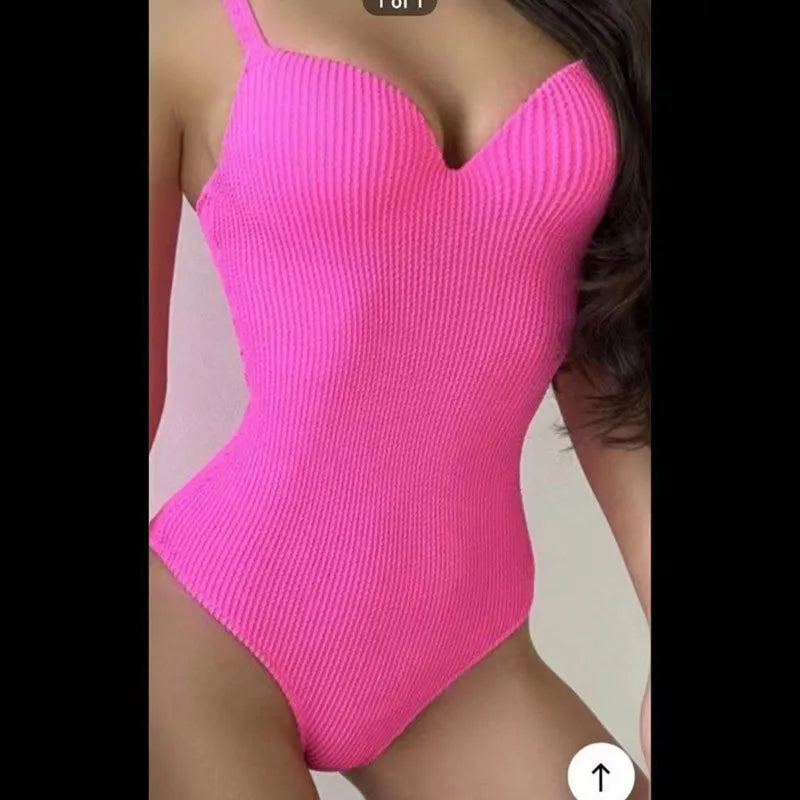 Women's sleeveless one-piece swimsuit with a small sunken stripe pattern in various colours.