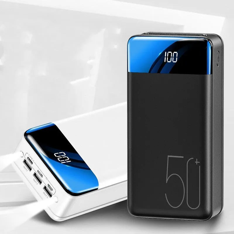 Black and white 50000mAh power bank with three USB output ports, showing dimensions of 169mm x 83mm x 52mm