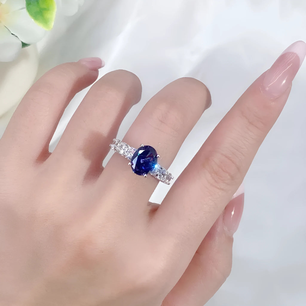 Heart-shaped sterling silver ring with a sparkling diamond-cut colour zircon stone.