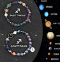 Pair of adjustable beaded bracelets with natural stone beads and a sterling silver zodiac charm on a wooden surface.