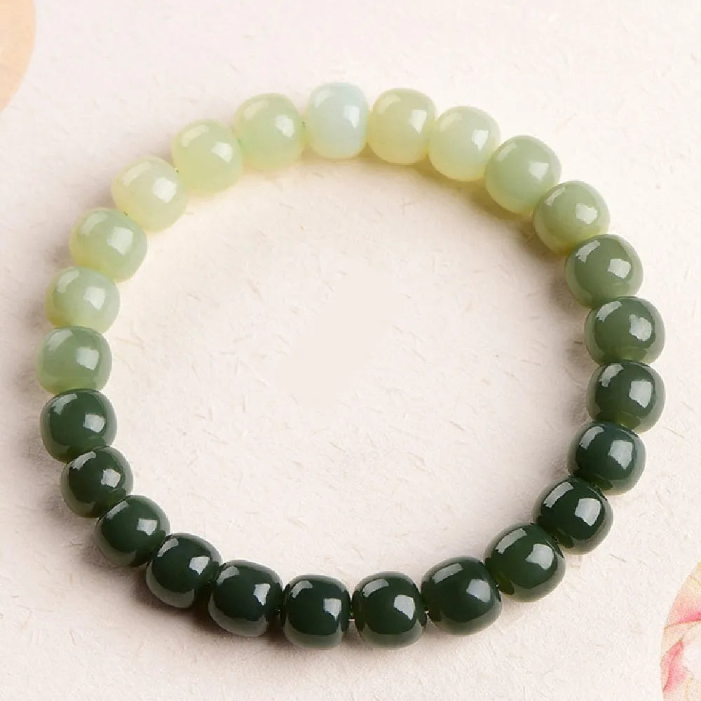 Hetian Jade bracelet with water gradient colour on polished beads.