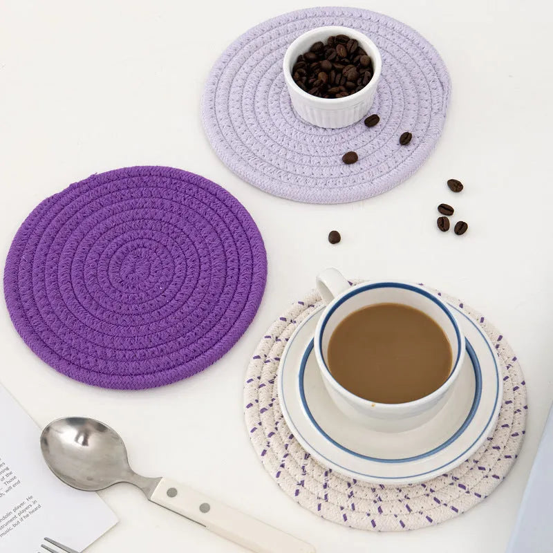 Three round cotton cord coasters in blue colour with modern simplicity design