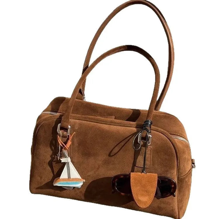 Brown suede large capacity underarm pillow bag with horizontal square shape and zipper closure