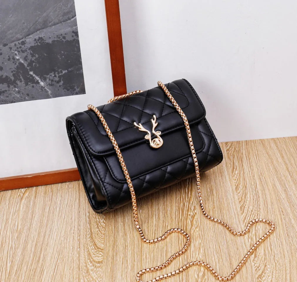 Summer Sheep Diamond Pattern PU Shoulder Bag, black and white, with chain strap and outer pocket.