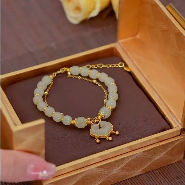 Green women's bracelet with safety lock bell pendant and electroplated mixed materials