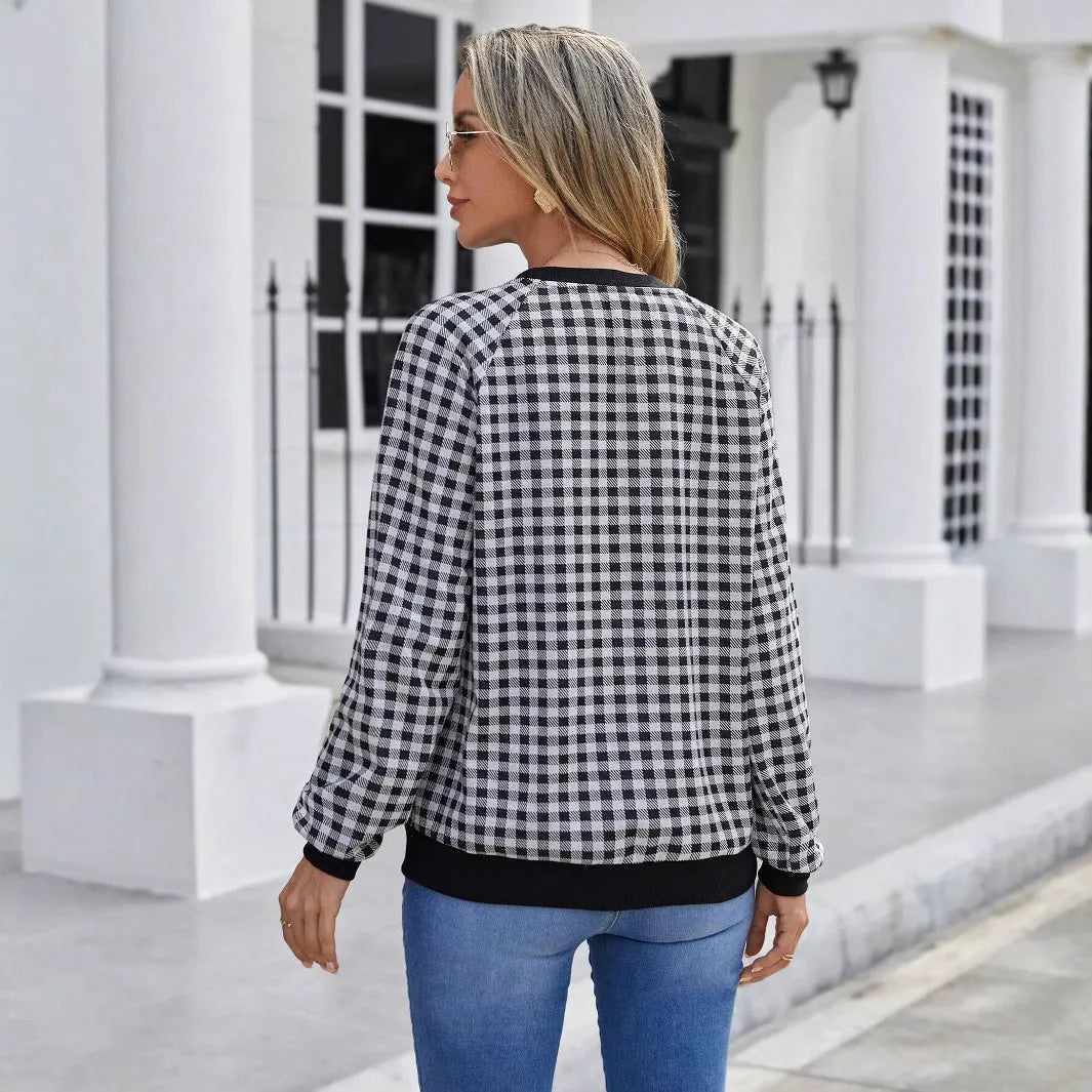 Black long sleeve polyester pullover sweater with a printed Japanese sweet plaid stripe pattern.