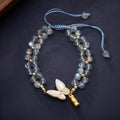 Grey moonstone butterfly charm woven bracelet for women with geometric retro styling