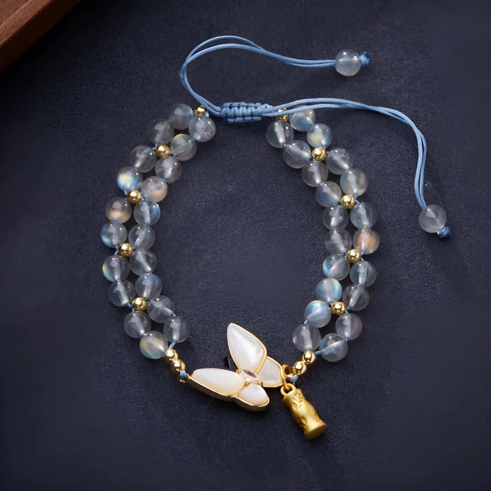 Grey moonstone butterfly charm woven bracelet for women with geometric retro styling