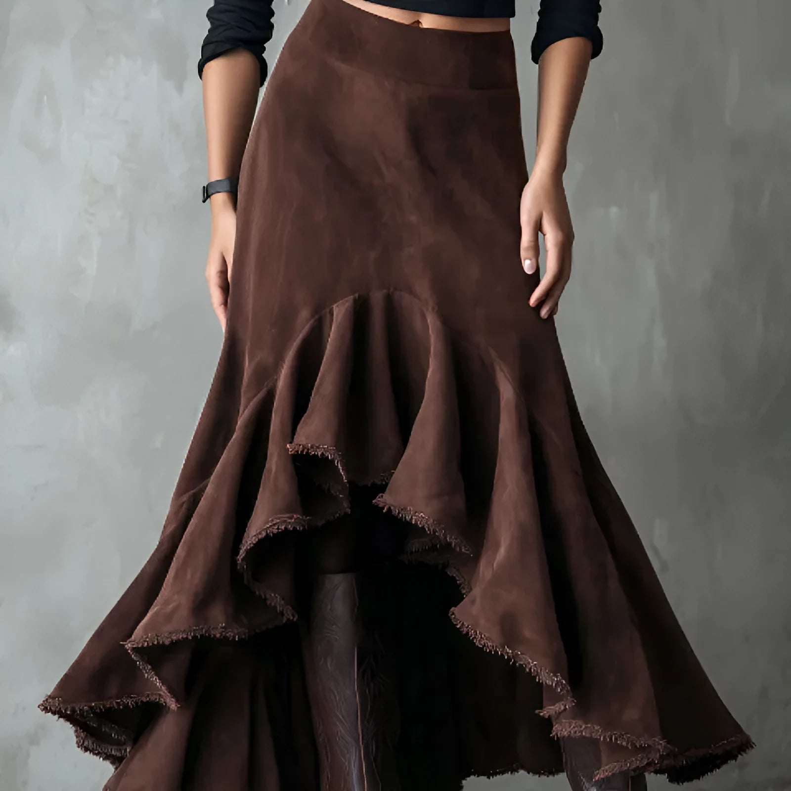 Brown women's high-low maxi skirt with a ruffle hem and textured eco suede finish.