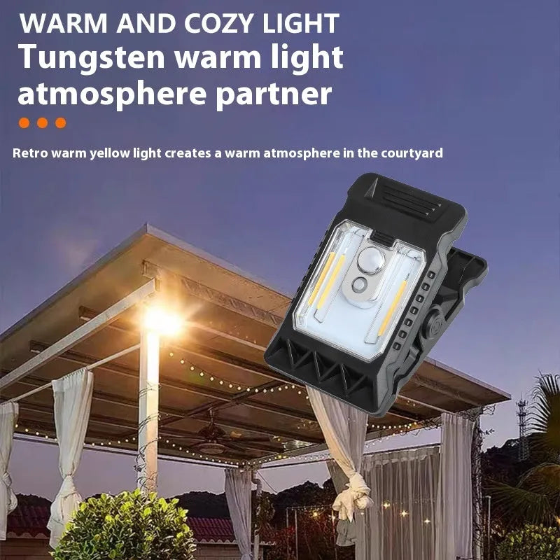 White motion sensor clip lamp for inside cupboards with LED light.