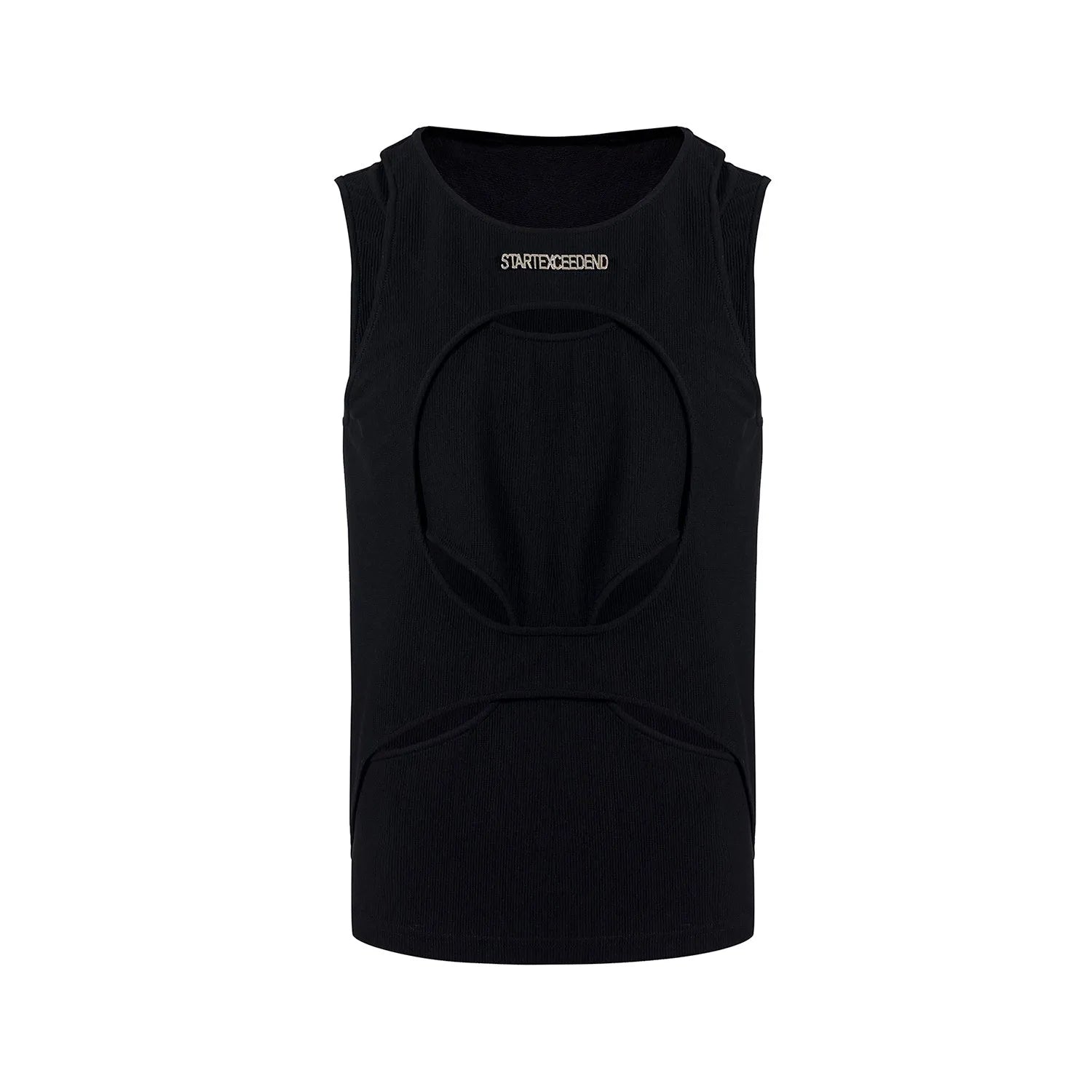 Man wearing a loose-fitting black sleeveless waistcoat with a round neck over a white t-shirt.