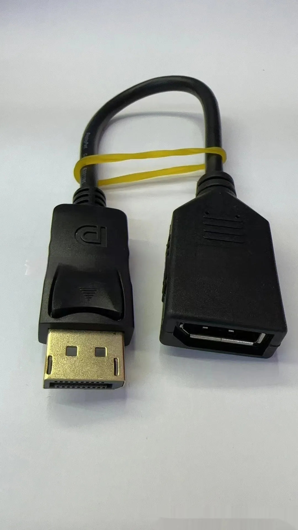 Black Display Port male to female extension cable approximately 10cm long