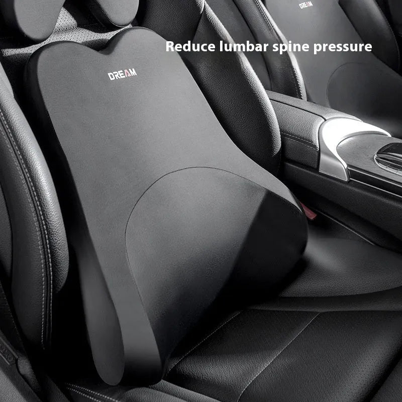 Memory foam car headrest and lumbar support set in grey on a car seat