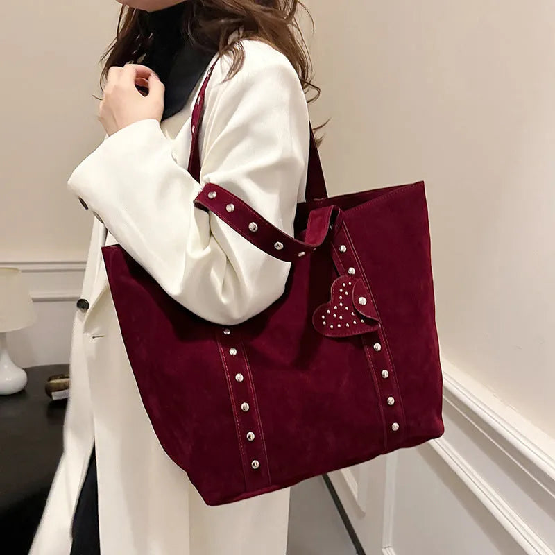 Black PU leather tote bag with double shoulder straps showing sandwich pocket and horizontal square shape