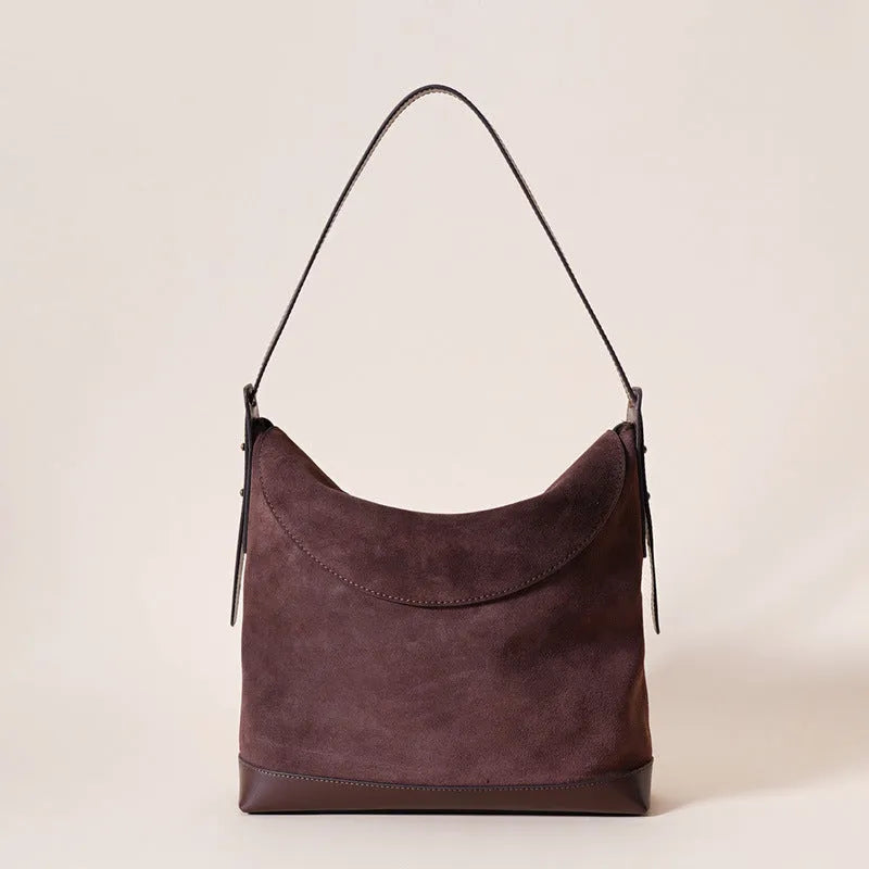 Genuine leather women's shoulder bag in brown with clamshell design and European retro styling