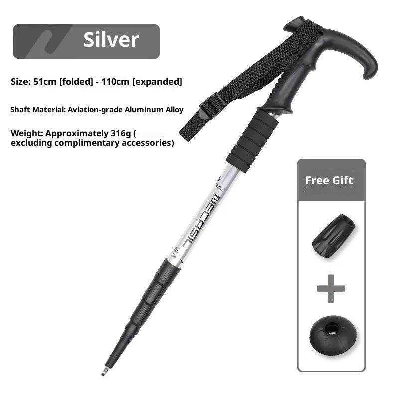 Silver four-section aluminium alloy alpenstock with curved handle, extended to full height on outdoor trail
