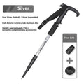 Silver four-section aluminium alloy alpenstock with curved handle, extended to full height on outdoor trail