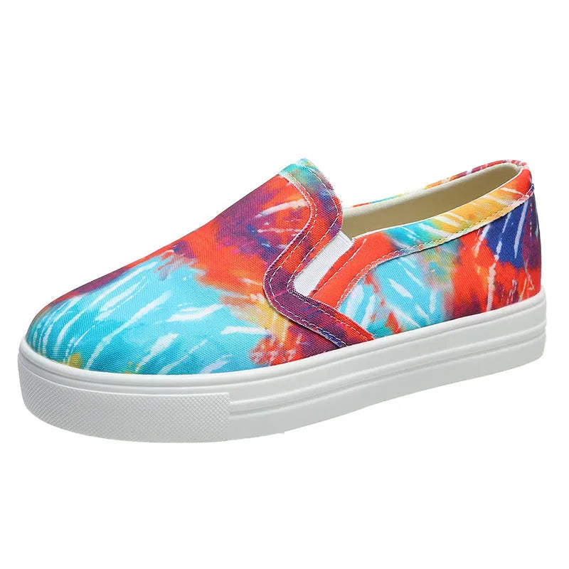Women's casual flat-bottom canvas sneakers in multiple colours on a white background