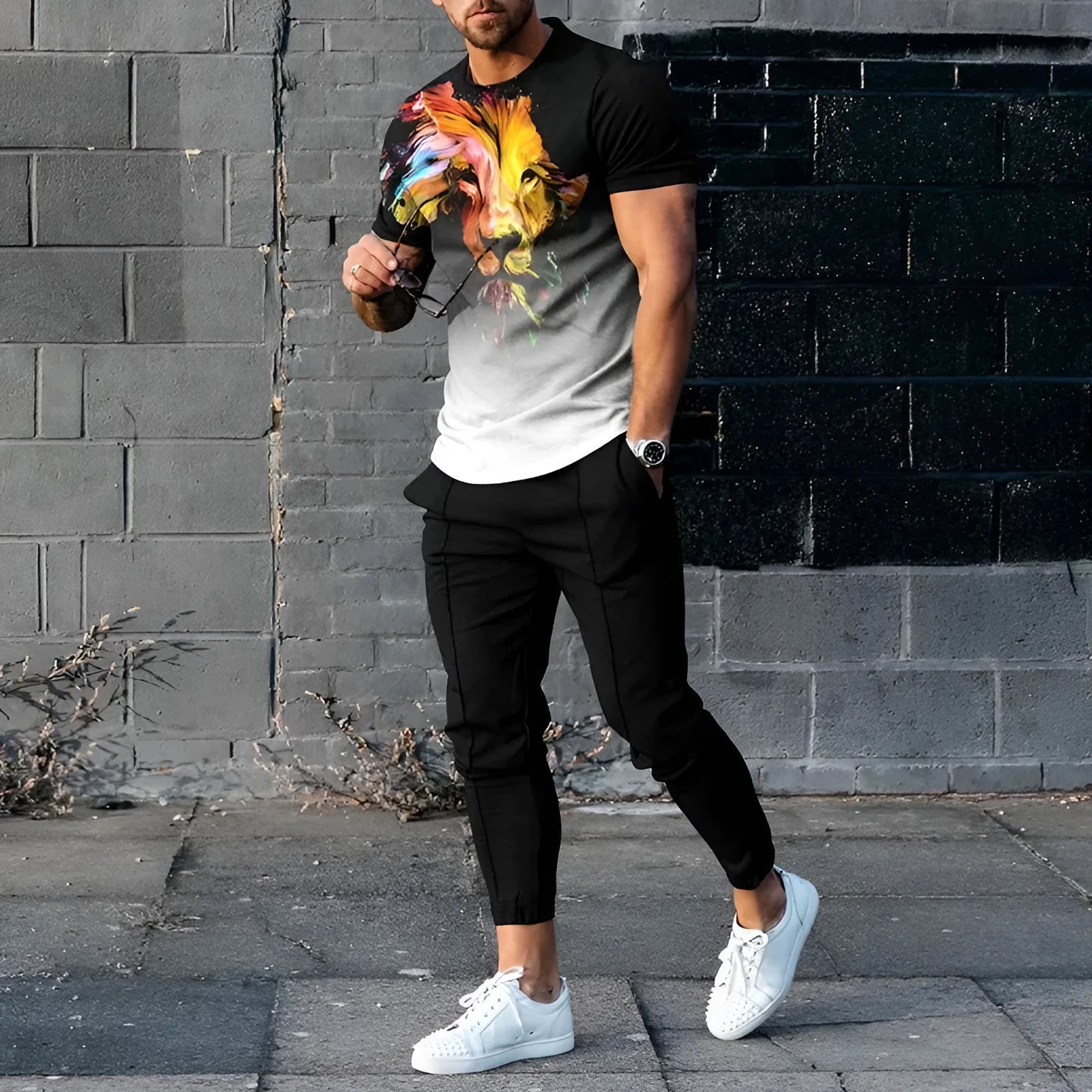 Men's short-sleeve printed tracksuit set with round neck pullover and matching trousers in polyester blend fabric