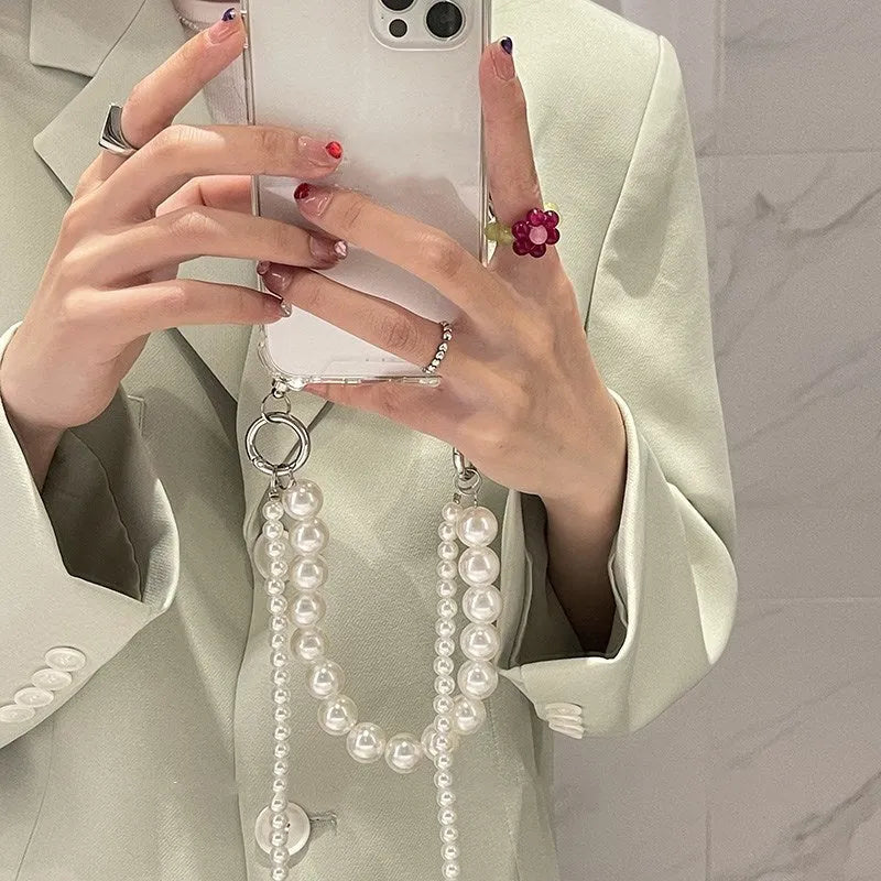 Big Pearl soft mobile phone case in Photo Colour with decorative chain, compatible with multiple iPhone models.