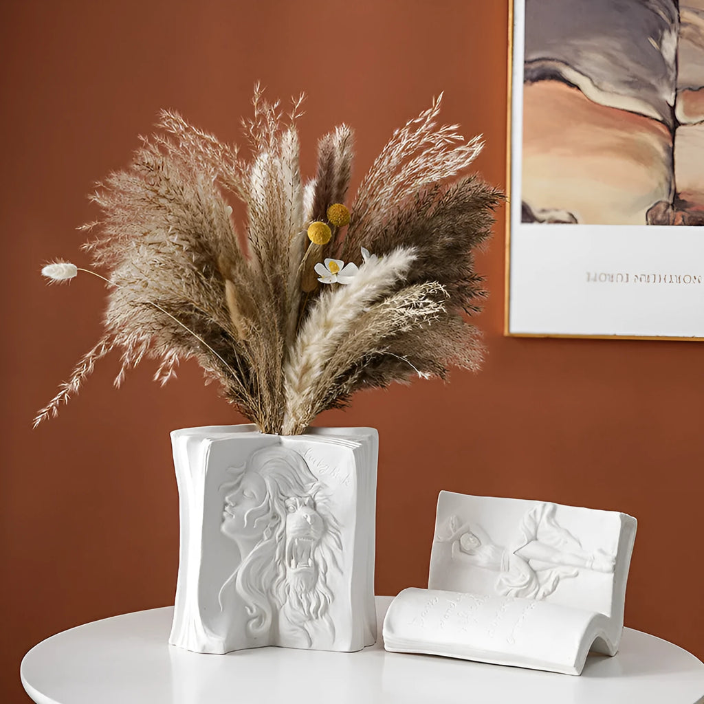 Glazed ceramic book stand ornament in one of four decorative styles on a wooden desk.