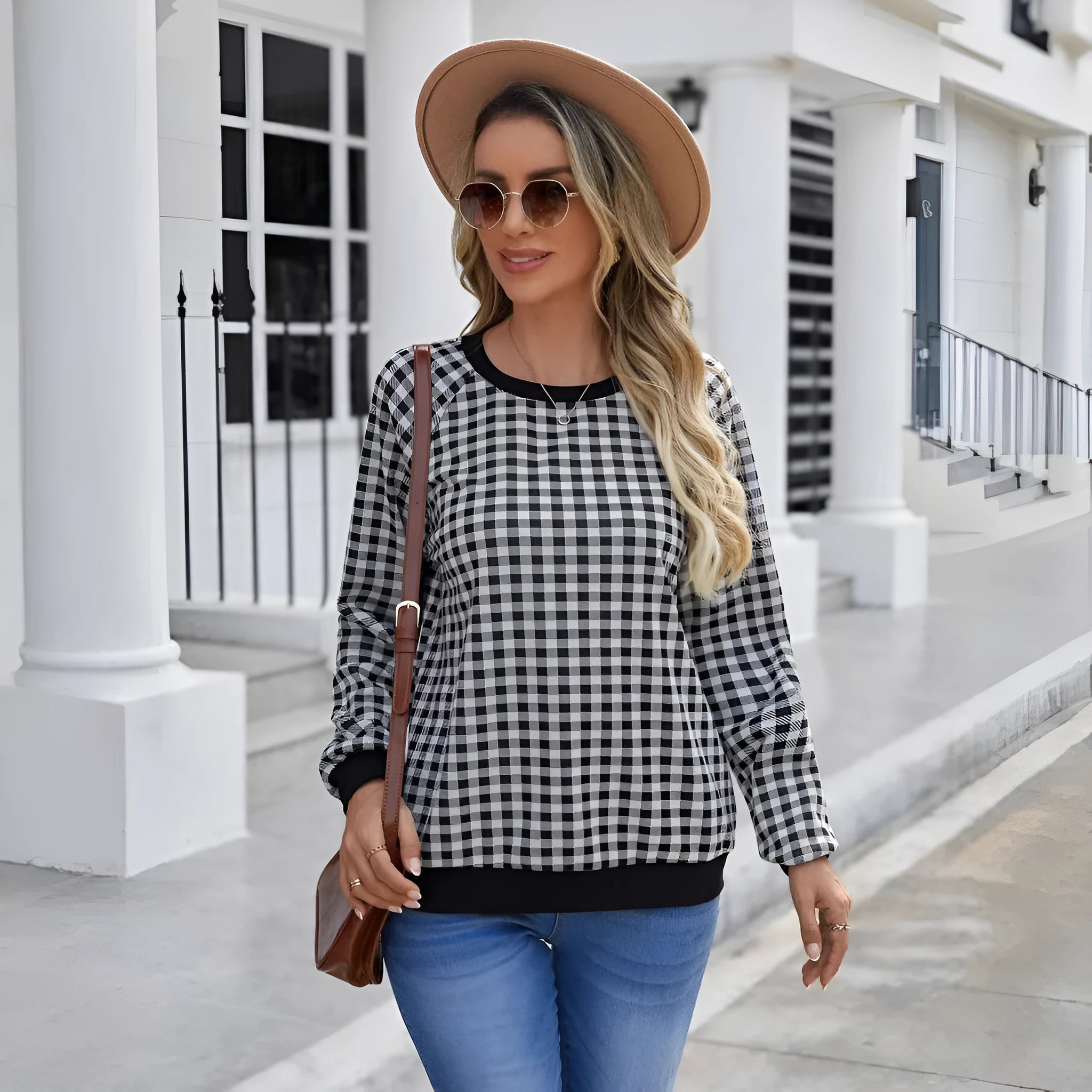 Black long sleeve polyester pullover sweater with a printed Japanese sweet plaid stripe pattern.