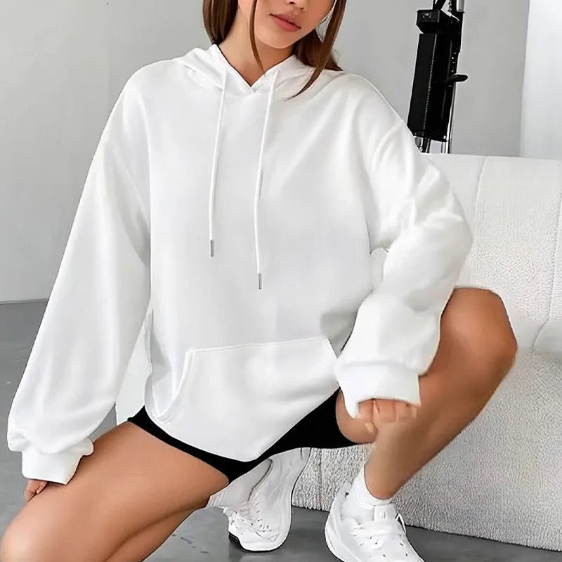 Women's loose grey sweatshirt with a drawstring hem and side pockets, laid flat.