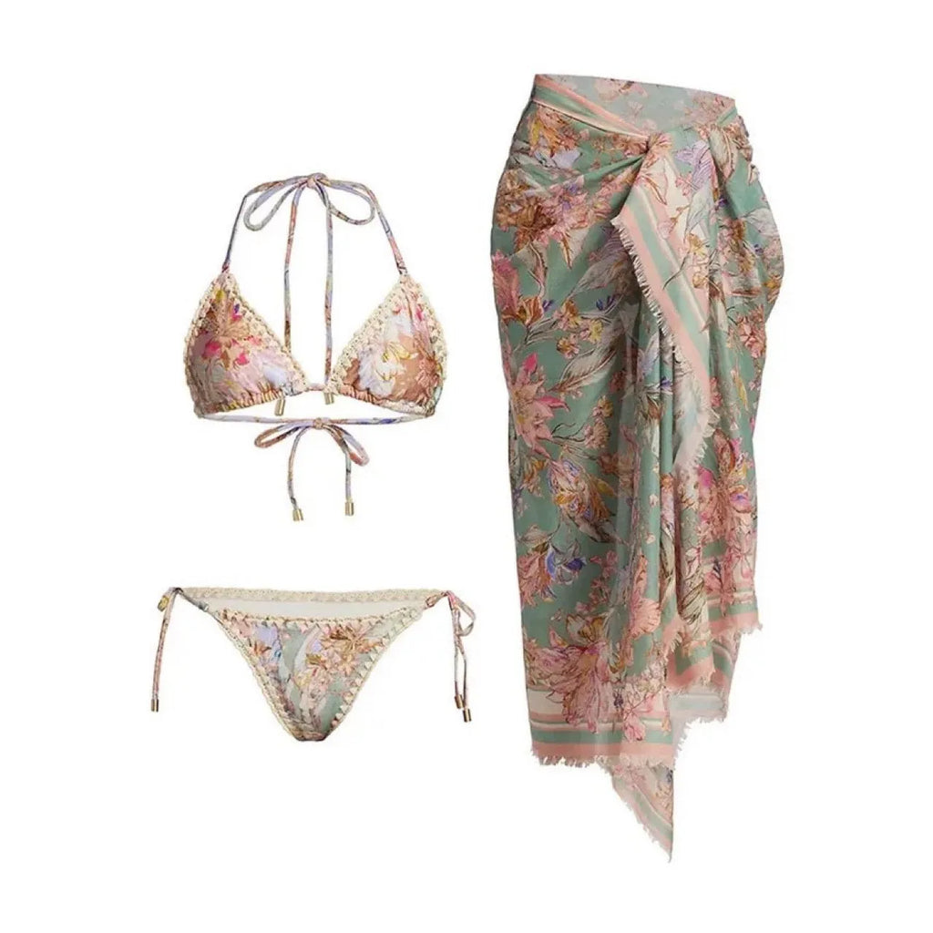 Women's creamy-white floral nylon bikini set with detachable skirt shown in sizes S-XXL