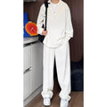 Men's black slim-fit long sleeve polo shirt and trousers two-piece casual suit set.