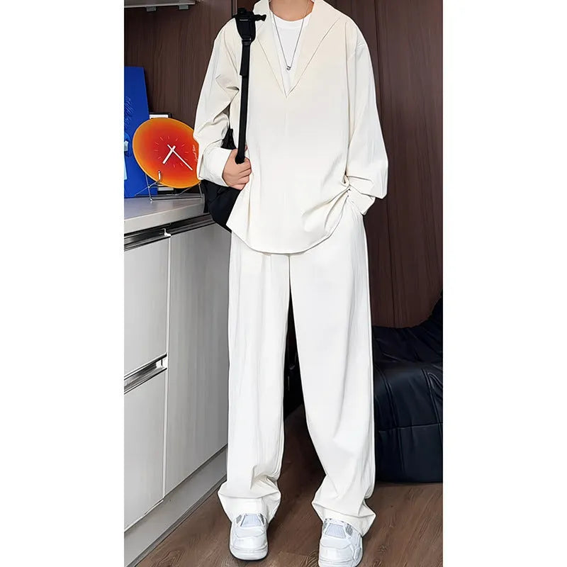 Men's black slim-fit long sleeve polo shirt and trousers two-piece casual suit set.