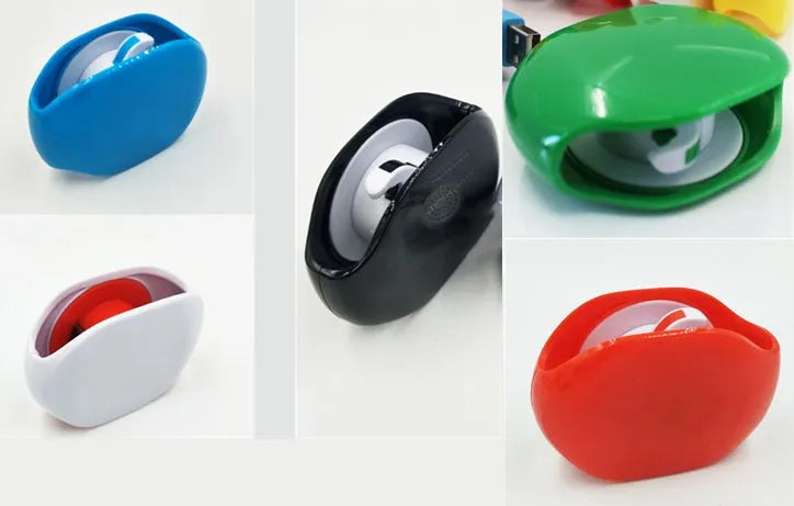 Compact automatic earphone winder in multiple colours on a grey background, showing extended cable.