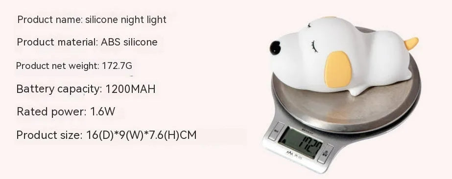 Silicone cartoon dog night lamp in two colours with a USB charging cable.