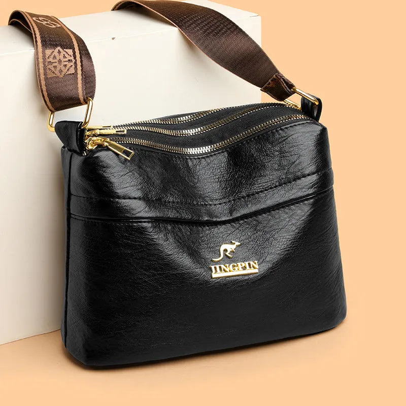 Brown PU messenger bag with multiple compartments and cross body strap