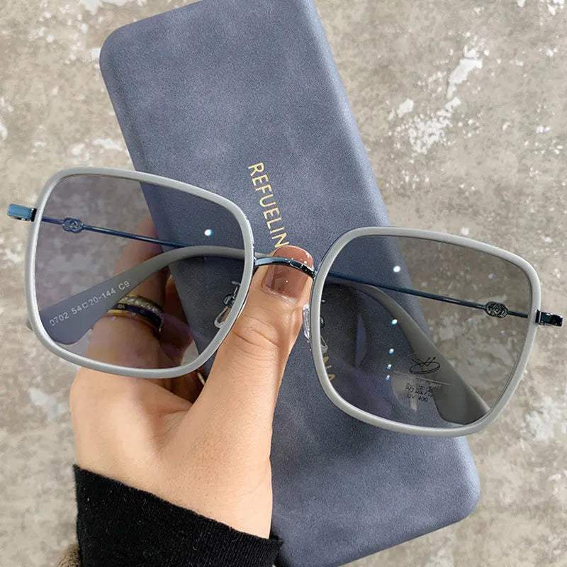 Photochromic myopia glasses with large frame, anti-blue light lens, available in four black gold frame colours