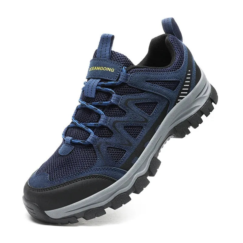 Men's black hiking shoes with low heel, breathable microfiber upper, and wear-resistant sole for camping and running