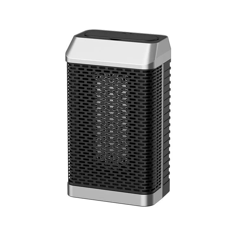 Black desktop electric heater with remote control on a wooden desk