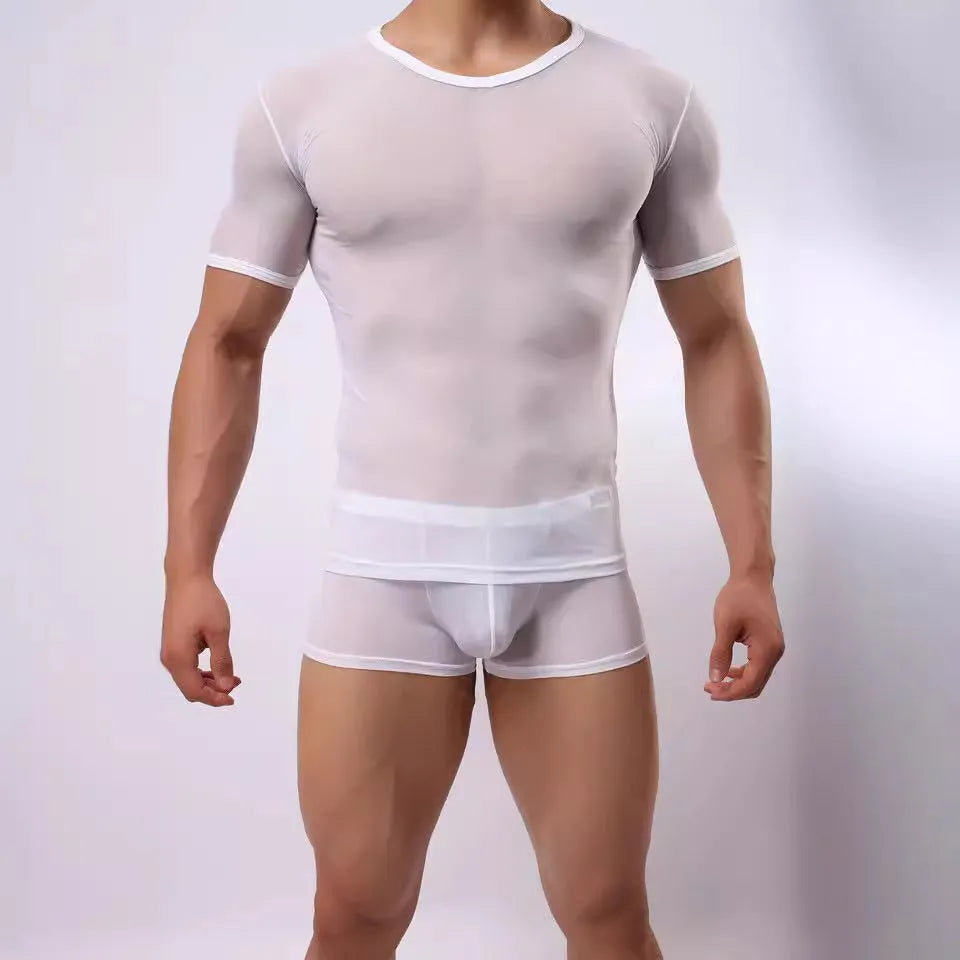 Man wearing a slim fit, translucent mesh t-shirt in a solid colour.