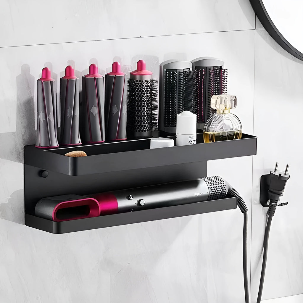 White double-layer aluminium bathroom storage rack mounted on a wall holding hair curlers.